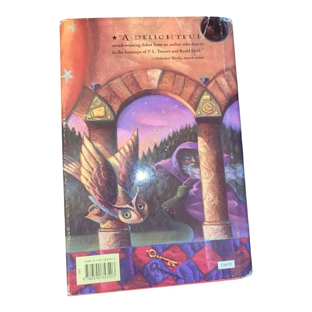 Harry Potter and the Sorcerer's Stone by J. K. Rowling (1998,‎ Hardcover)